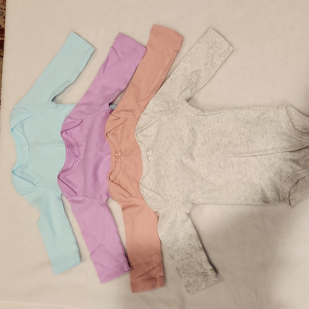 Carter's 7 sets of body suits